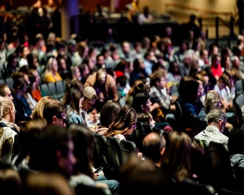 Spectator crowd at an indoor event